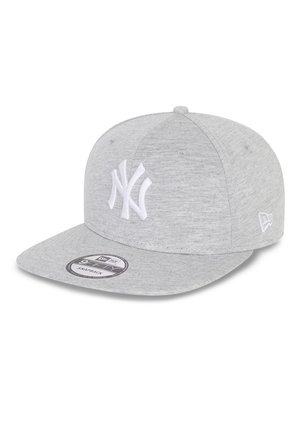 Light gray snapback cap with white "NY" logo embroidered on front and New Era logo on side, flat brim, and branding sticker on visor.