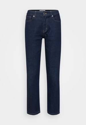 Jeansi din denim de culoare albastră închisă, cu un design drept, stil cu cinci buzunare și cusături în contrast. Prezintă un nasture metalic și un fermoar pentru închidere.