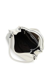 White leather handbag with a textured surface, top zipper closure, and an interior lined in dark fabric; features two shoulder straps.