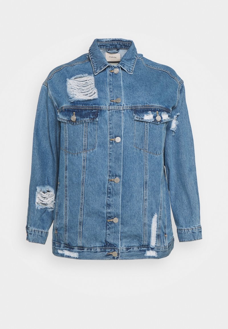 Veste en denim bleu avec fermeture à boutons, deux poches poitrine et plusieurs patchs usés sur les manches et le devant.