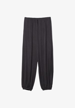 Løse sorte bukser med elastisk talje og elastiske, opsamlede manchetter, lavet af blødt, let stof.