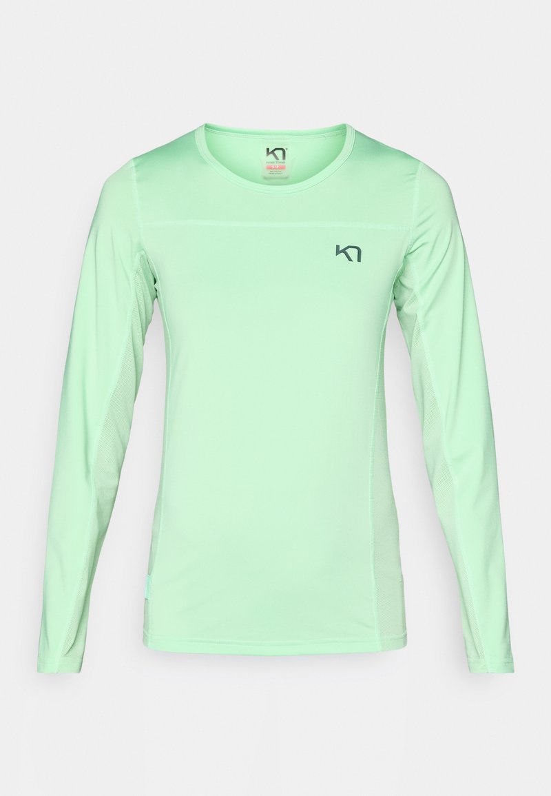 Jasnozielona, długorękawowa koszulka sportowa z okrągłym dekoltem, z siateczkowymi panelami po bokach i małym logo na piersi. Gładka faktura materiału.