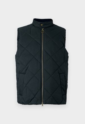 Colete acolchoado verde-escuro com gola alta, fecho de correr frontal e dois bolsos laterais. Apresenta costura em padrão de losangos e uma etiqueta com marca.