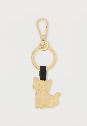 Portachiavi in metallo dorato a forma di gatto con una cinghia nera, attaccato a un anello rotondo con un fermaglio per un fissaggio sicuro.