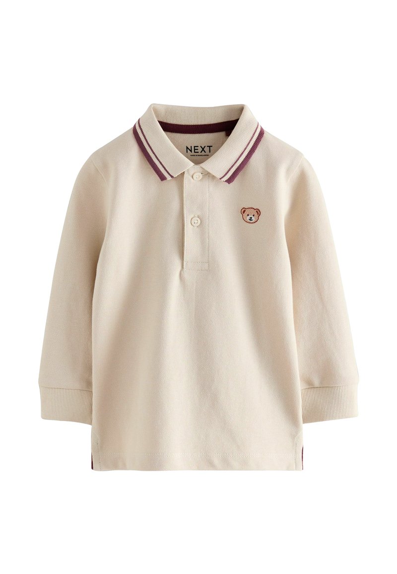 Cremefarbene Langarm-Polohemd aus Baumwolle mit einem bordeauxfarbenen gestreiften Kragen und einer kleinen Teddy-Bär-Stickerei auf der Brust.