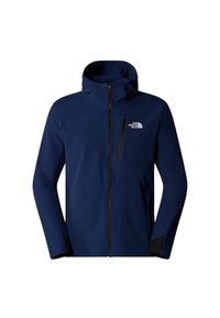 Veste softshell bleu marine à capuche avec fermeture éclair sur le devant, poche poitrine zippée et logo The North Face sur la poitrine gauche.