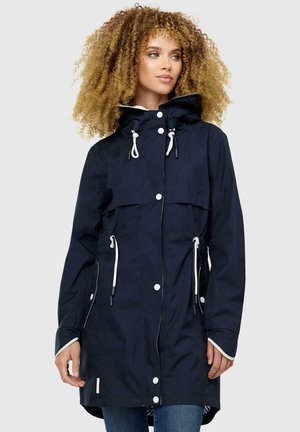Navy waterproof jacket with a hood, white accents, zip and snap closures, two front pockets, and adjustable drawstrings at the waist.