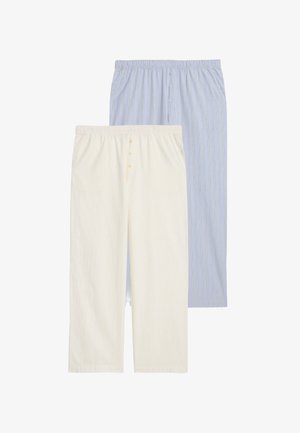 Ensemble de pantalon de pyjama en coton, l'un crème avec des rayures claires, l'autre bleu avec des rayures plus foncées, doté d'une taille élastique et de détails en bouton.