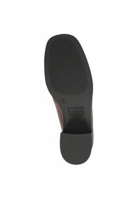 Soletta in gomma nera con presa texture, tacco leggero e branding Caprice. Parte superiore liscia in marrone con una forma elegante e curva.