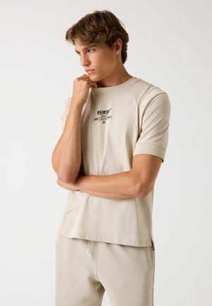 LOGOSCHRIFTZUG - Apdrukāts T-krekls - beige