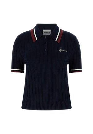 Polo shirt côtelé bleu marine avec un col rayé rouge et blanc, manches courtes et logo "Guess" brodé sur la poitrine.