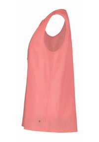 Koralli väri sleeveless toppi, jossa on pyöreä pääntie, löysä malli ja pieni metallinen yksityiskohta helman lähellä. Valmistettu kevyestä kankaasta.