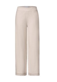 Pantalon large beige clair avec taille élastique et bordure en dentelle à l'ourlet, présenté sur fond blanc.