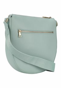 Borsa a spalla verde menta realizzata in materiale testurizzato, con tasca davanti con zip, hardware in tono oro e una larga strap in tessuto.