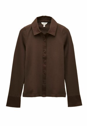 Brown long-sleeve shirt with a button-down front, ribbed texture and a contrasting collar. Made from soft fabric with subtle stitching details.
