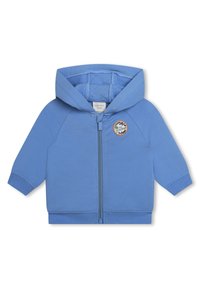 Felpa con zip di colore blu chiaro, realizzata in tessuto morbido, dotata di tasca a marsupio e di un patch rotondo ricamato sul lato sinistro del petto.