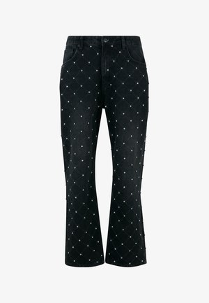 Black denim jeans featuring a diamond quilted pattern adorned with small silver studs, straight leg design, and standard five-pocket style.