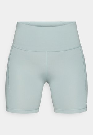 Pantaloncini sportivi verde menta realizzati in tessuto elastico, con vita alta e tasche laterali, cuciture flatlock per un comfort ottimale.