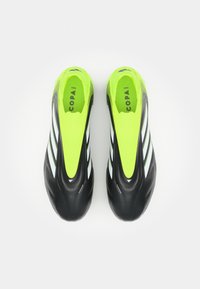 Black soccer cleats with a vibrant neon green upper. Features three white stripes and a streamlined design for enhanced performance.