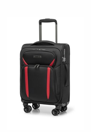 Black wheeled suitcase with red accents, hard exterior, retractable handle, multiple zippers, and four spinner wheels for easy maneuverability.