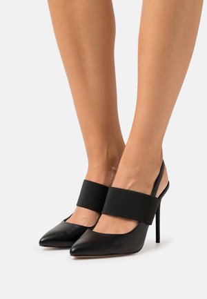 Tacones - black