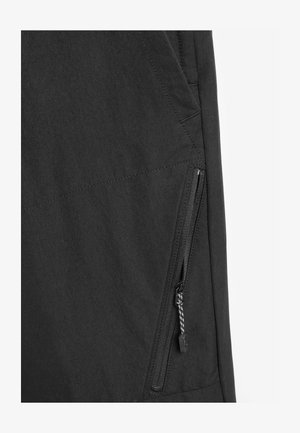 Material negru pentru jachetă cu finisaj mat, prevăzut cu un buzunar cu fermoar pe lateral, cusături intricate și un design modern elegant.