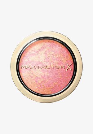 Max Factor X blush in a round gold and black compact. Features a marbled texture with shades of pink and peach. Smooth finish.