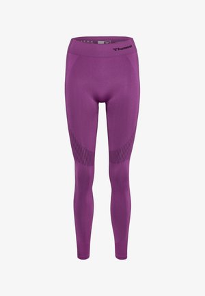 Lila Sportleggings mit hohem Bund, die ein strukturiertes Muster an den Seiten und atmungsaktives Material für zusätzlichen Komfort bieten.