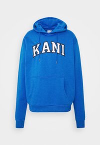 Sudadera con capucha azul con bolsillo canguro, capucha con cordón y letras "K.A.N.I" en blanco y negro. Hecha de material suave con puños acanalados.