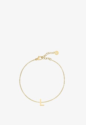 Bracciale in oro con pendente minimalista a forma di lettera "L", lunghezza regolabile con chiusura a moschettone e un piccolo tag rotondo.