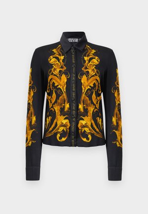 Crna košulja dugih rukava s gumbima, ukrašena raskošnim zlatnim baroknim cvjetnim uzorcima na prednjem dijelu, rukavima i ovratniku, s oznakom Versace Jeans Couture.