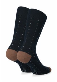 Granatowe skarpetki wykonane z bawełny, z prążkowanym wzorem, zdobione małymi, kolorowymi kropkami oraz kontrastującymi brązowymi częściami na palcach i pięcie.