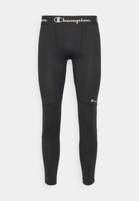 Czarne legginsy sportowe o gładkiej teksturze, z elastycznym paskiem z logo i detalami przeszycia wzdłuż nogawek.
