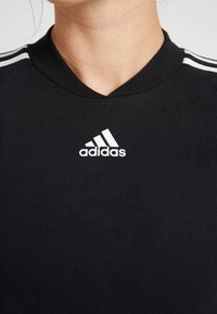 adidas Performance Robe en jersey - black