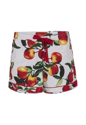 Short blanc avec des imprimés de pommes rouges et jaunes, des feuilles vertes, un cordon rouge et un bord rouge à l'ourlet.