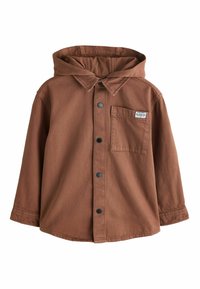 Veste chemise marron à boutons avec une capuche. Dotée de pressions noires et d'une poche poitrine unique. Le tissu présente une finition texturée.