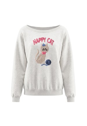 Lysegrå hættetrøje med en smilende kat iført en blå hat og en pink butterfly, der sidder ved siden af en blå garnnøgle og ordene "HAPPY CAT".