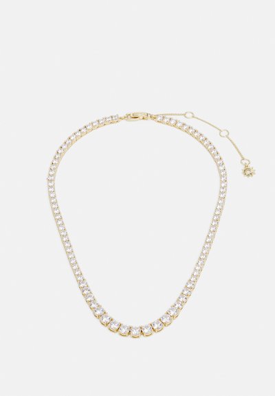 Collana dorata con una fila di gemme rotonde e trasparenti. Catena liscia con chiusura a moschettone e catena di estensione regolabile.