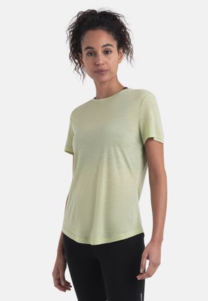 Light green short-sleeve t-shirt with a round neckline and a relaxed fit, featuring a smooth texture and slightly curved hem.