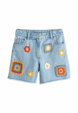 Light blue denim shorts with front pockets and colorful crocheted floral patches in red, yellow, white, orange, and blue.