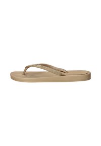 Beige flip-flop met een textuurzool, smalle banden met een golvend patroon en een plat ontwerp. Gemaakt van zacht, flexibel materiaal.