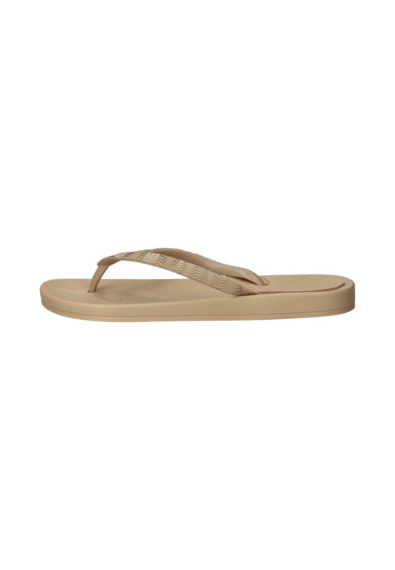 Beige flip-flop met een textuurzool, smalle banden met een golvend patroon en een plat ontwerp. Gemaakt van zacht, flexibel materiaal.