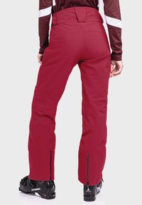 Schöffel WEISSACH - Skihose - rot