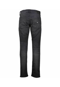 Ciemne dżinsy z prostymi nogawkami, wyposażone w dwie tylne kieszenie i subtelne wyblakłe detale wzdłuż ud.