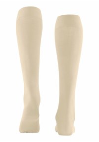 Hautfarbene Kniestrümpfe aus glattem Stoff, mit einem gerippten oberen Bund und nahtlosem Design. Die Farbe ist durchgehend einheitlich.