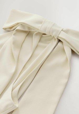 Ivory fabric bow with a soft, textured finish, featuring draped elements and trailing ends, secured at the center with a smooth tie.