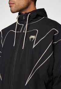Venum ATTACK HOODIES - BLACK/WHITE - Training jacket - black/white