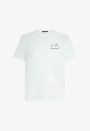 T-shirt bianca a maniche corte con piccolo logo nero "KARL LAGERFELD PARIS 21 RUE ST-GUILLAUME" sul lato sinistro del petto.