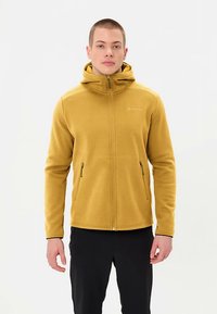 Gele fleecejas met capuchon, ritssluiting aan de voorkant en twee zijzakken. Kenmerkt zich door een gladde textuur en een minimalistisch logo op de borst.