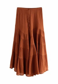 Roestkleurige tiered maxi rok van gekreukt materiaal. Voorzien van een elastische tailleband en een vloeiende uitstraling. Geverfd oppervlak en zachte draping.